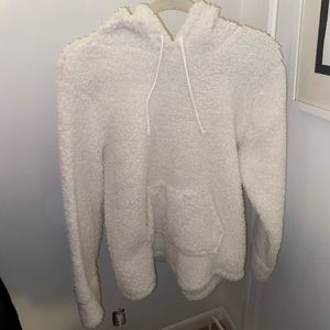 fluffy, comfy pull over with pocket on the front